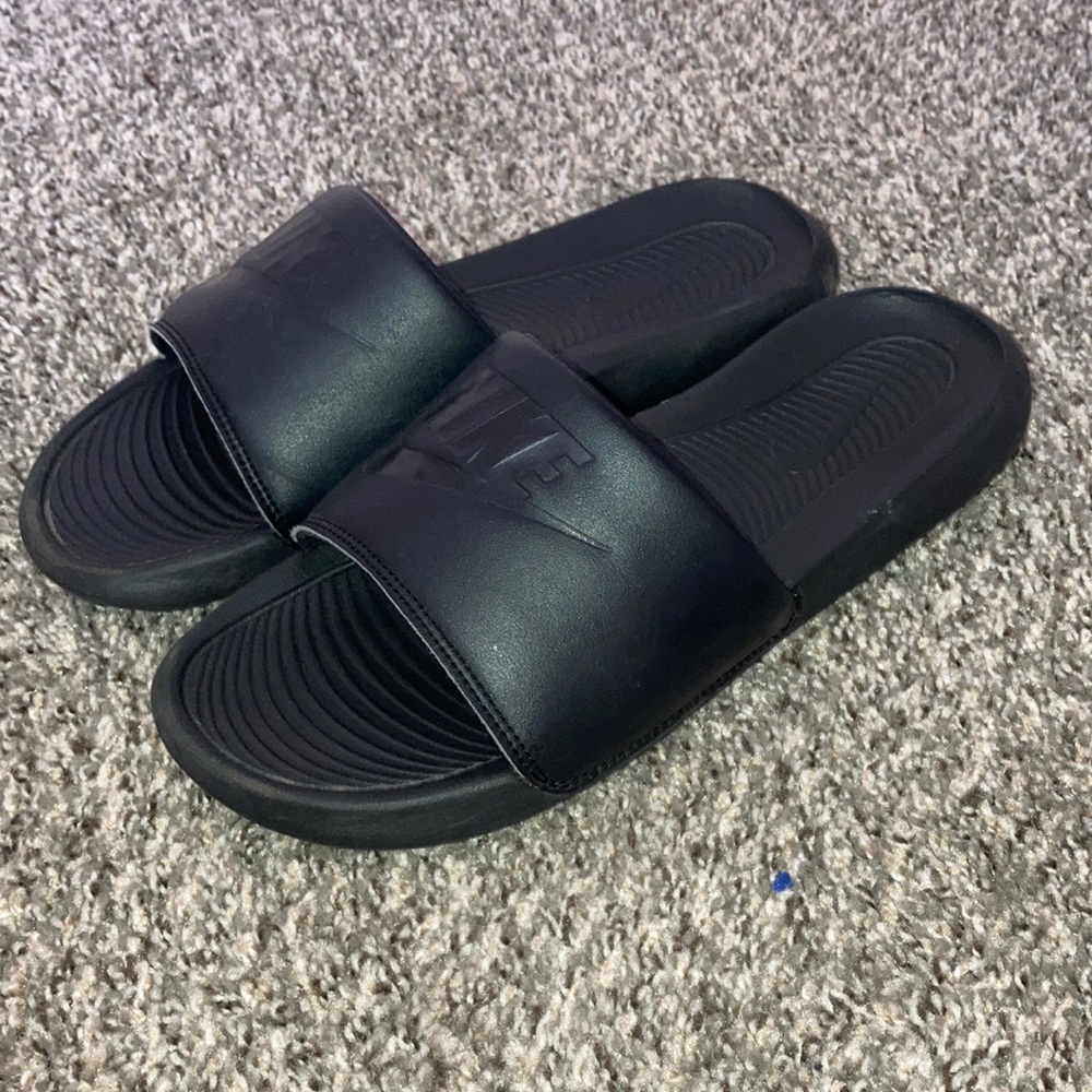 Black Nike slides